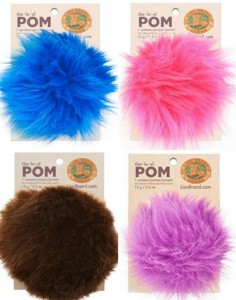 Pom poms are hot stuff right now! And Lion Brand has The Pom - a big, soft, fuzzy, furry, fun pom pom ready to add to any project!