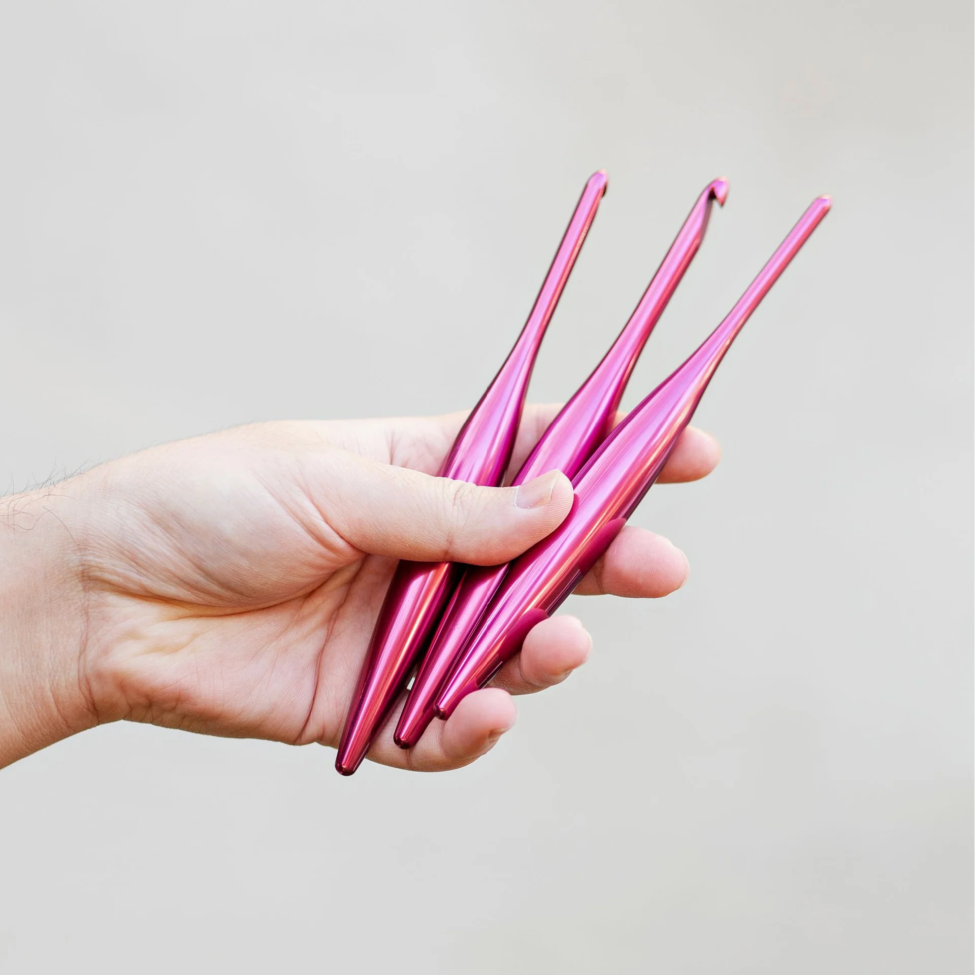 Furls Polished Raspberry Streamline Metal Crochet Hook 1 ergonomic metal crochet hook